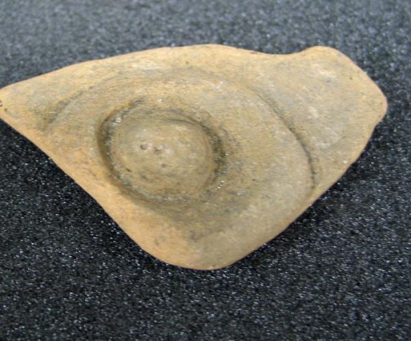 sherd, with applied decoration, part of a vessel
