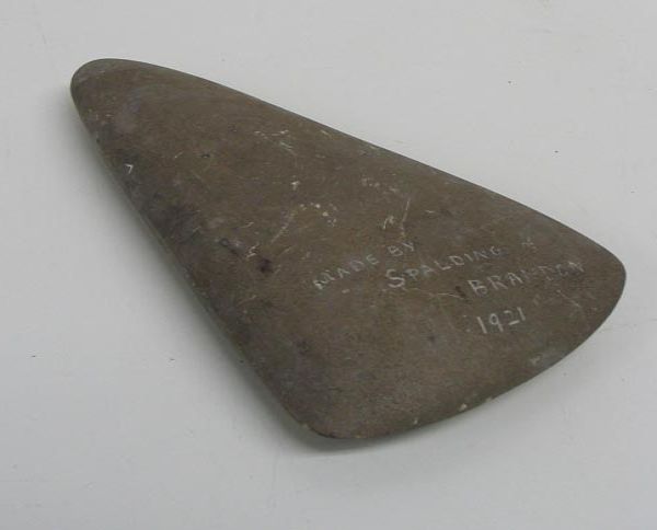 stone imitation Neolithic axe head with pointed butt