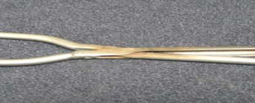 tongs possibly for pleating or crimping